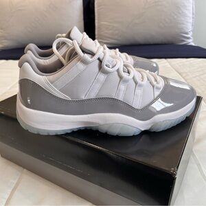 Brand new pair of low top white/university blue air Jordan 11s